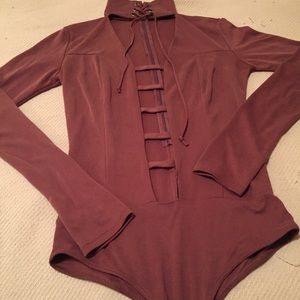 Dark pink bodysuit with neck tie and chest cutouts
